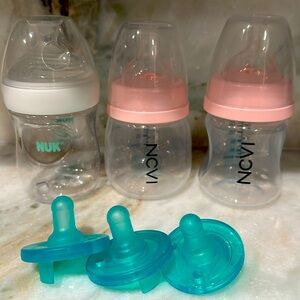 3 baby bottles / pacifiers NCVI & NUK newborn bundle lot